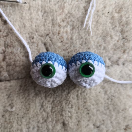 Playful large eyes for the crocheted octopus.